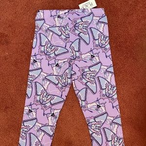 The Children’s Place girls purple butterfly capri leggings